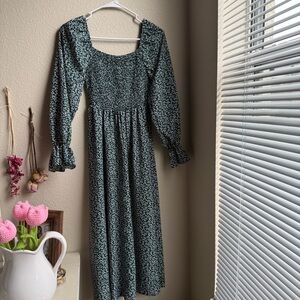Green shin length dress